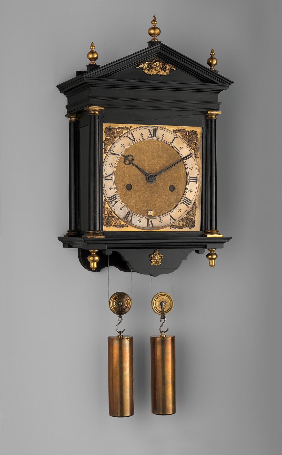 A wall clock with a calendar